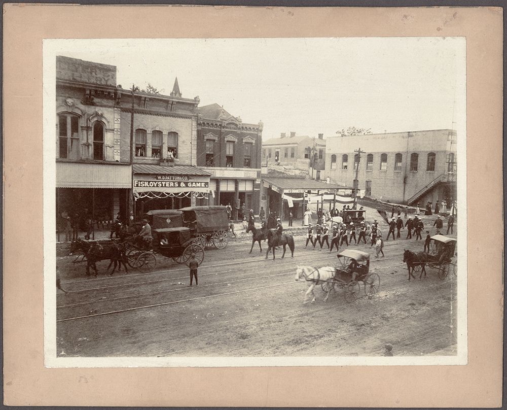 Congress Avenue in Austin, 1888, with carriages and shopfronts