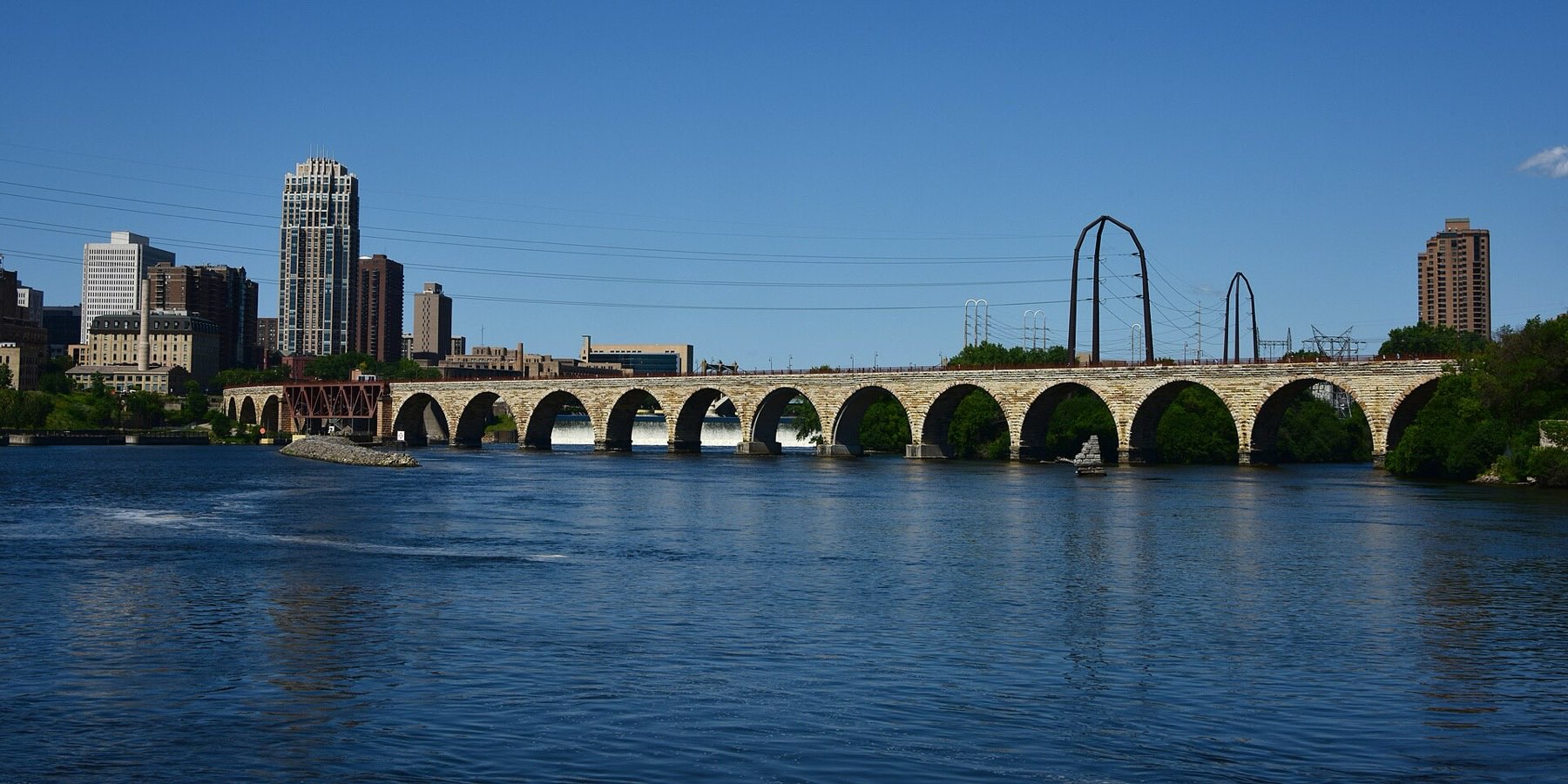 The Stone Arch Bridge over the Mississippi River in Minneapolis on a clear day